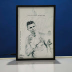 Framed artwork of a Christiano Ronaldo with text on a blue  background Backlit frame
